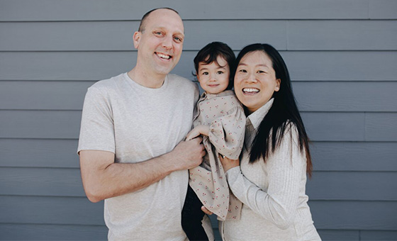 Family in front of their house